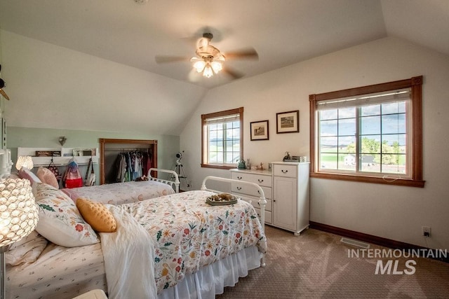 2350 Trail Rd, Moscow, ID 83843 - bedroom featuring lofted ceiling, carpet flooring, a closet, baseboards, and a ceiling fan