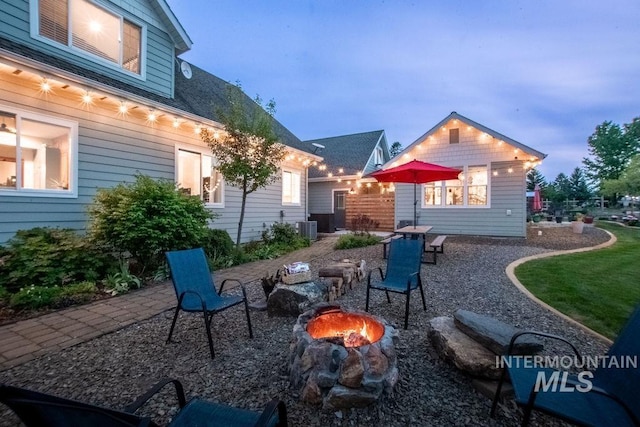 2350 Trail Rd, Moscow, ID 83843 - view of patio featuring an outdoor fire pit and central air condition unit