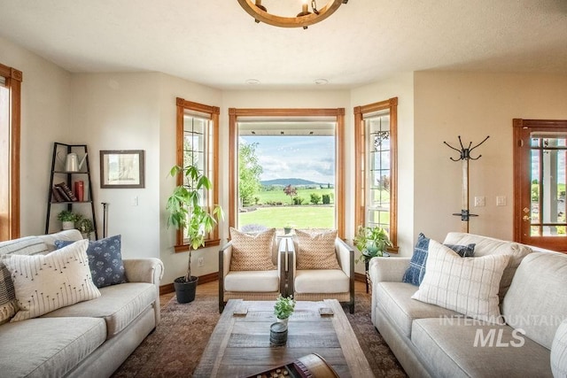 2350 Trail Rd, Moscow, ID 83843 - living room featuring baseboards and wood finished floors