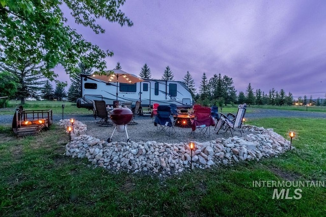 2350 Trail Rd, Moscow, ID 83843 - view of grassy yard featuring a fire pit