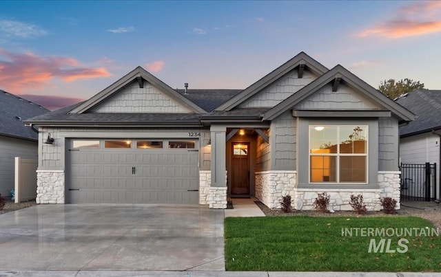 1071 E Star Pine Ln, Eagle, ID 83616 - craftsman-style home with stone siding, a garage, and driveway