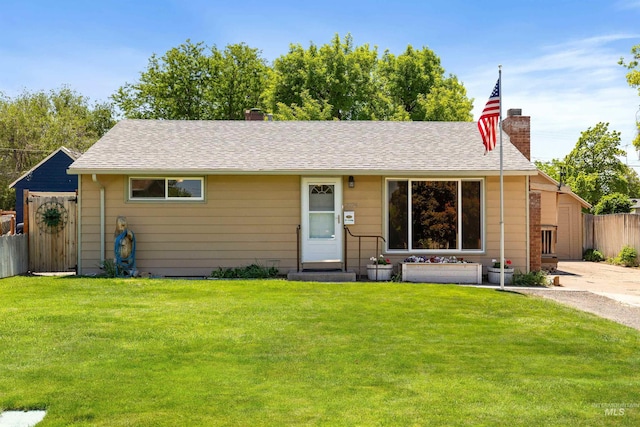 2074 11th Ave E, Twin Falls, ID 83301 - view of front facade featuring a chimney and roof with shingles