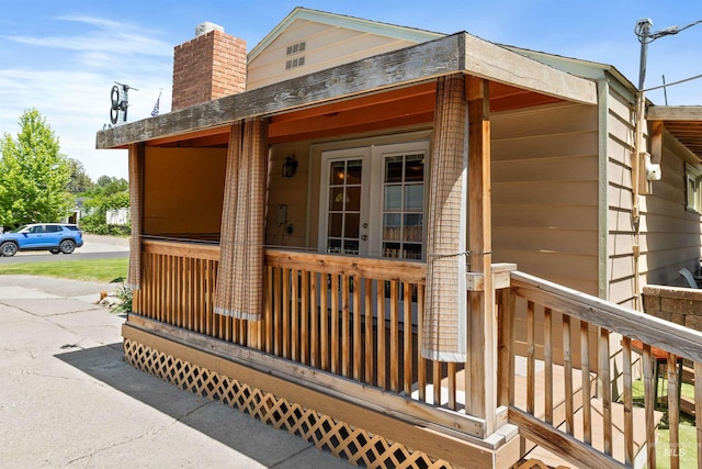 2074 11th Ave E, Twin Falls, ID 83301 - exterior space with french doors and a chimney