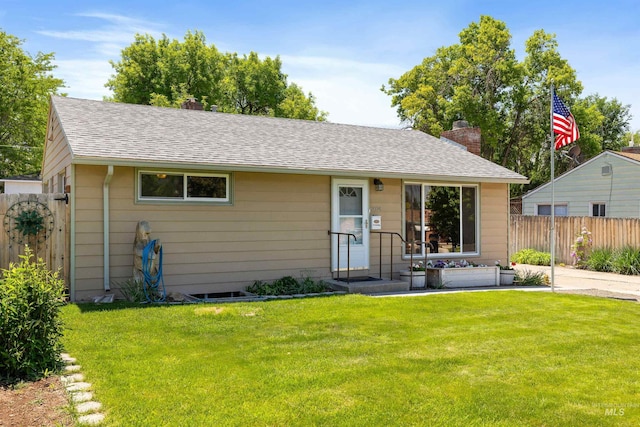 2074 11th Ave E, Twin Falls, ID 83301 - bungalow-style home with a chimney and roof with shingles