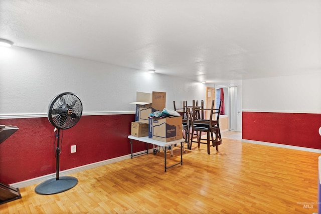 2074 11th Ave E, Twin Falls, ID 83301 - misc room with wood finished floors, baseboards, and a textured wall