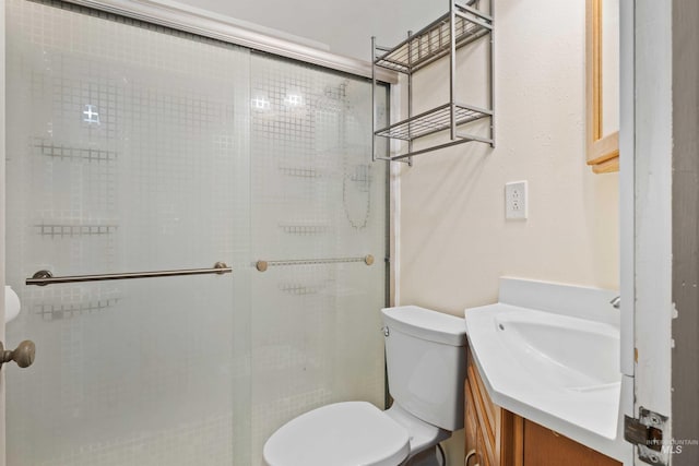 2074 11th Ave E, Twin Falls, ID 83301 - full bath featuring vanity, a shower stall, and toilet