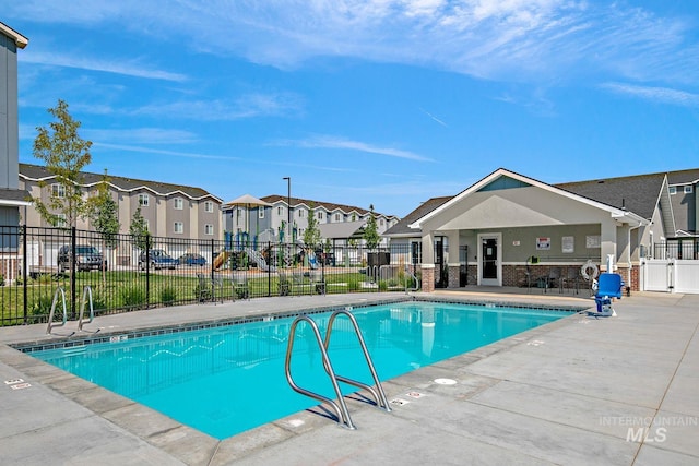 4044 W Ski Jump Ln, Meridian, ID 83642 - pool with a residential view, fence, and a patio