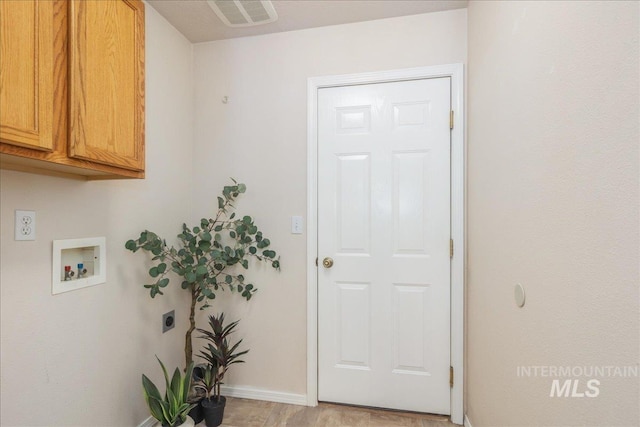 14325 W Comisky, Boise, ID 83713 - laundry room with cabinet space, electric dryer hookup, and hookup for a washing machine