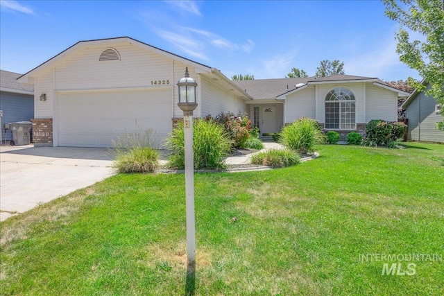 14325 W Comisky, Boise, ID 83713 - single story home featuring an attached garage, driveway, a front lawn, and brick siding