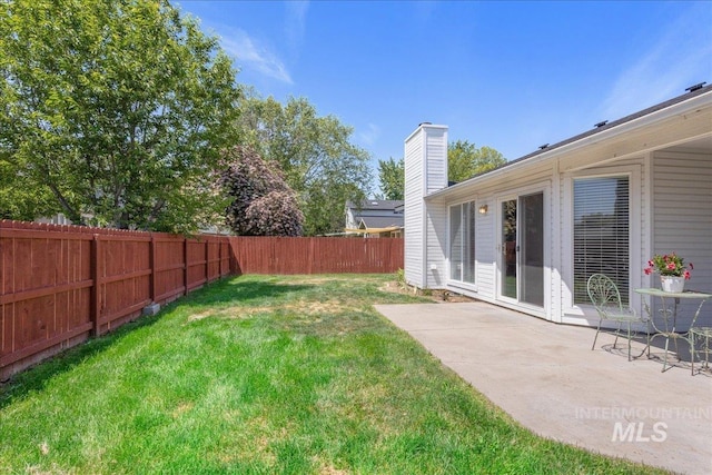 14325 W Comisky, Boise, ID 83713 - fenced backyard featuring a patio area