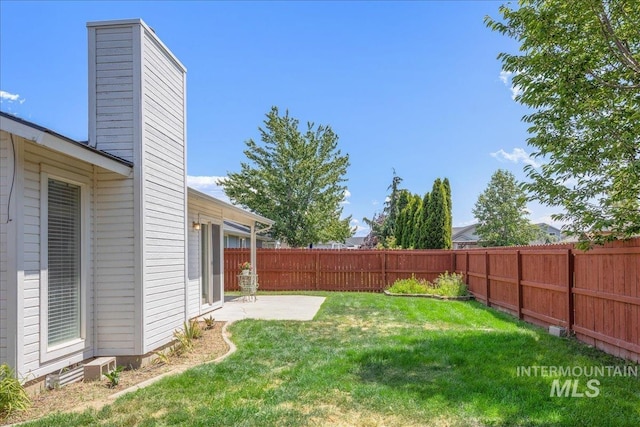 14325 W Comisky, Boise, ID 83713 - fenced backyard with a patio
