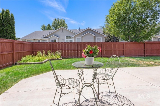 14325 W Comisky, Boise, ID 83713 - fenced backyard with a patio area