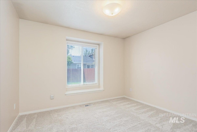 14325 W Comisky, Boise, ID 83713 - carpeted spare room featuring baseboards