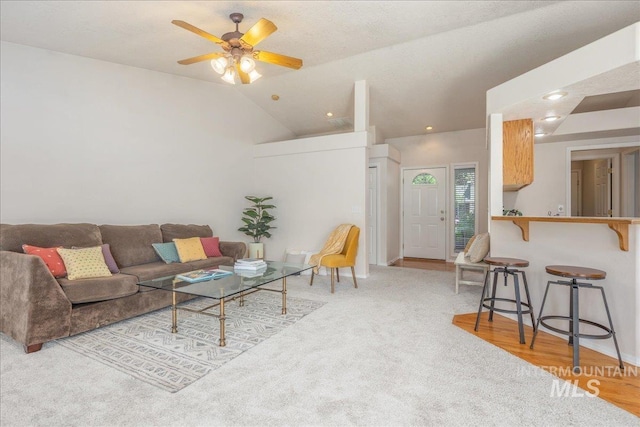 14325 W Comisky, Boise, ID 83713 - carpeted living room featuring vaulted ceiling and a ceiling fan