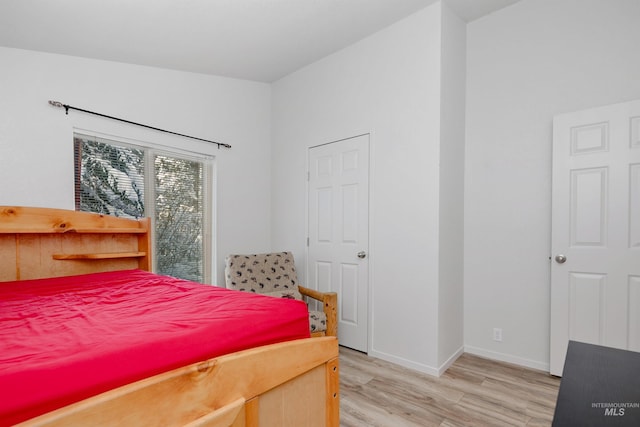 bedroom with light hardwood / wood-style floors