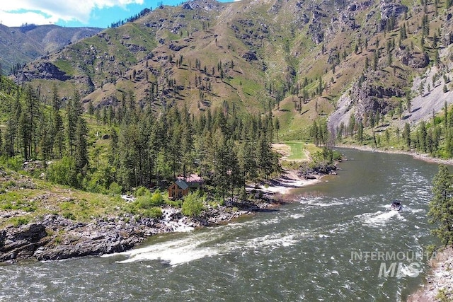 property view of mountains featuring a water view