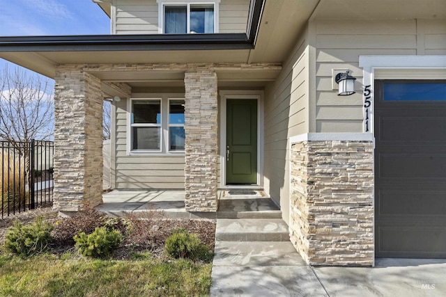 property entrance featuring a garage