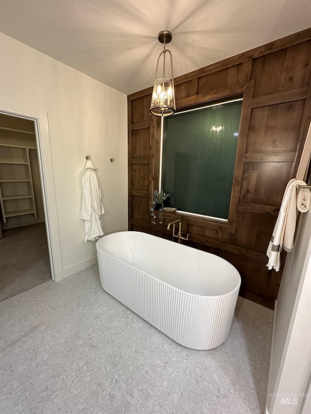 2253 Caribel St, Twin Falls, ID 83301 - full bath with a freestanding bath and a chandelier