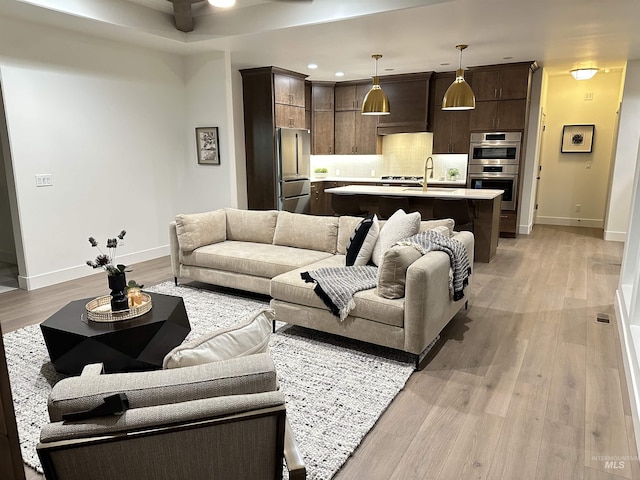 2253 Caribel St, Twin Falls, ID 83301 - living room with light wood-style flooring, recessed lighting, and ceiling fan