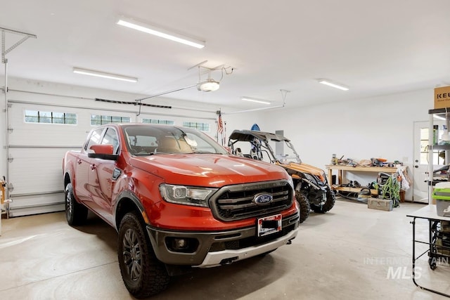 garage featuring a garage door opener