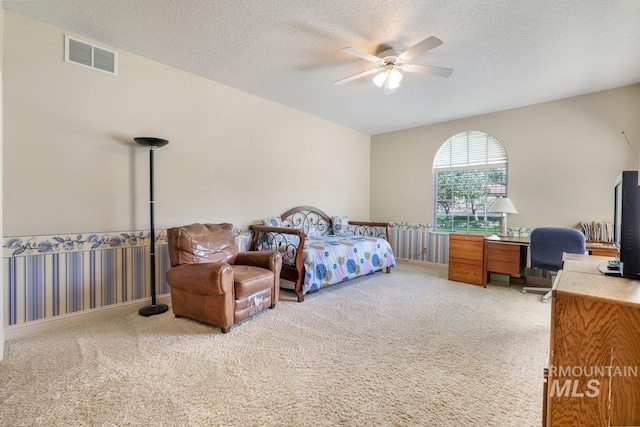 3283 Willow Cir, Twin Falls, ID 83301 - bedroom with light colored carpet, a desk, a textured ceiling, and ceiling fan