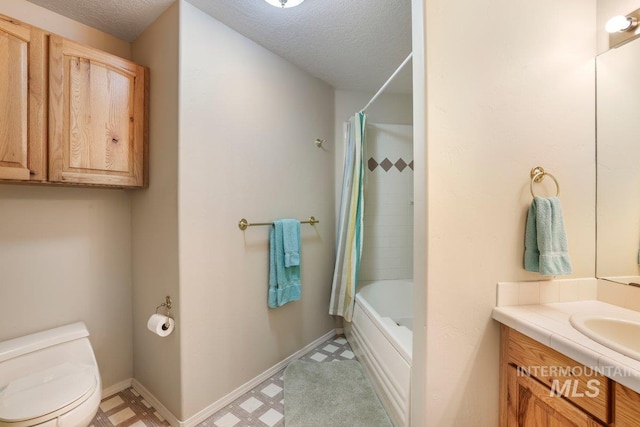 3283 Willow Cir, Twin Falls, ID 83301 - full bathroom featuring tile patterned floors, a textured ceiling, vanity, and shower / bathtub combination with curtain