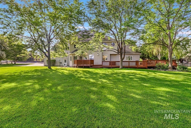 3283 Willow Cir, Twin Falls, ID 83301 - view of grassy yard featuring a deck