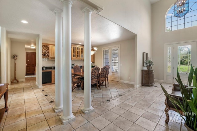 3283 Willow Cir, Twin Falls, ID 83301 - foyer featuring a chandelier, light tile patterned floors, healthy amount of natural light, and recessed lighting
