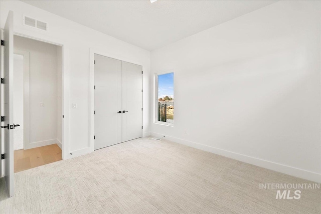 unfurnished bedroom featuring a closet