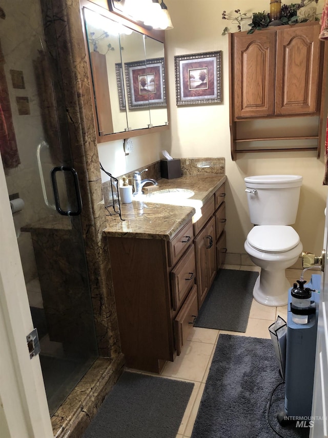 2726 Fairmont Dr, Burley, ID 83318 - bathroom with vanity, tile patterned floors, and a stall shower