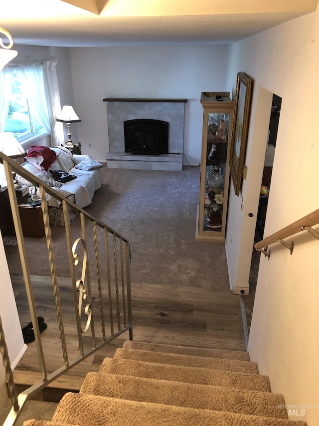 2726 Fairmont Dr, Burley, ID 83318 - stairway featuring wood finished floors and a fireplace