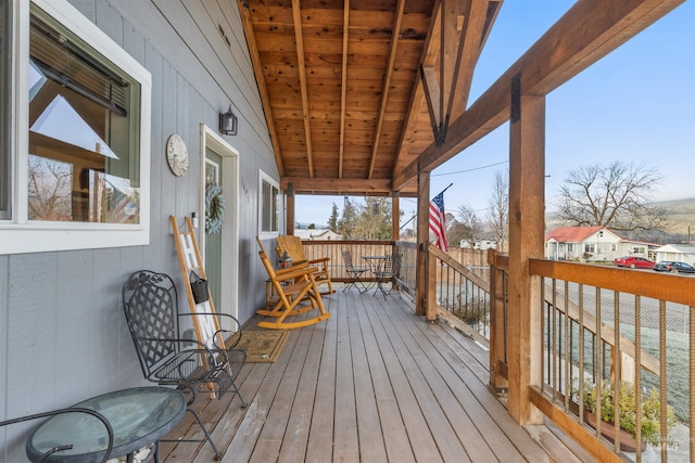 wooden terrace featuring a porch