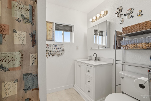 bathroom with toilet, vanity, and a shower with curtain