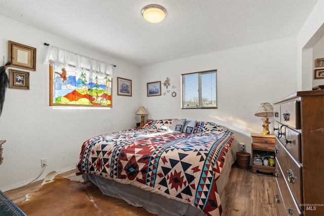 bedroom featuring hardwood / wood-style floors