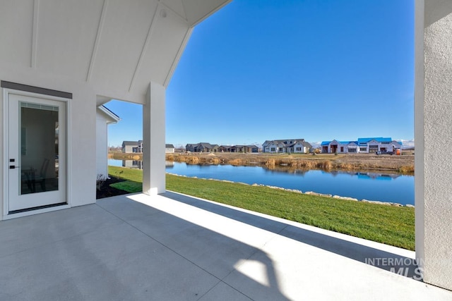 view of patio / terrace with a water view