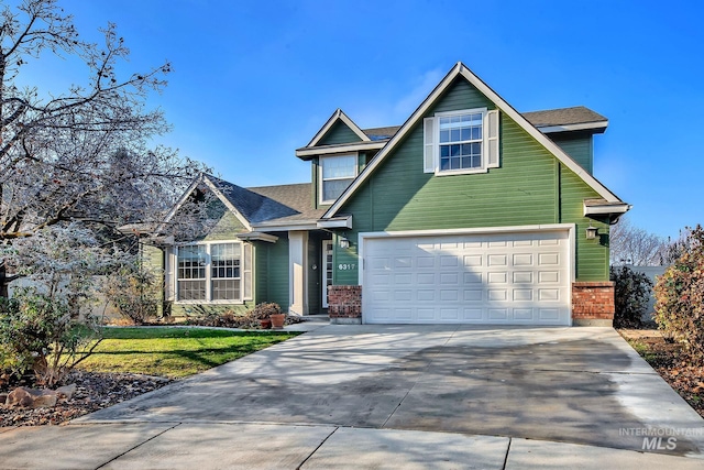 view of front of property with a garage