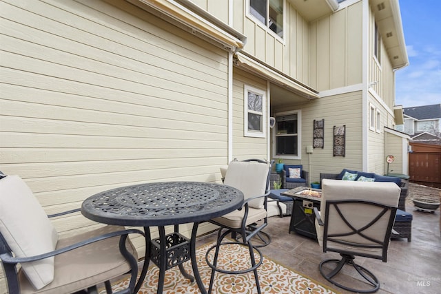 view of patio featuring a fire pit