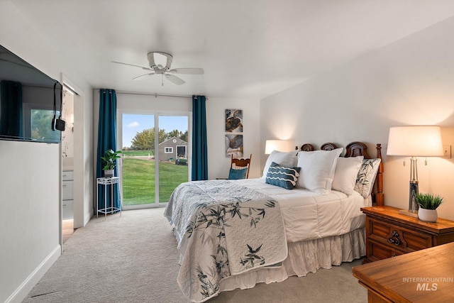 carpeted bedroom with access to outside, ceiling fan, and baseboards