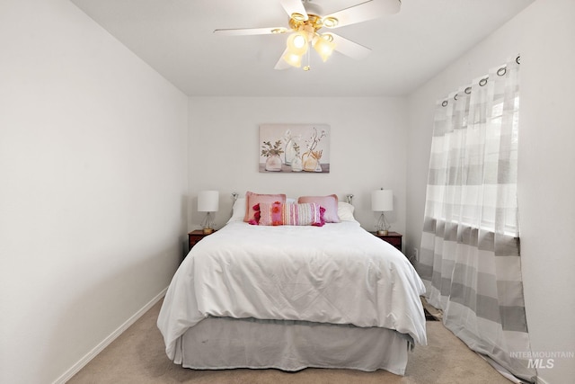 bedroom featuring carpet, ceiling fan, and baseboards