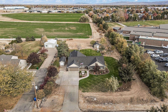 birds eye view of property with a residential view