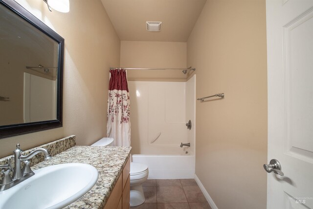 full bathroom featuring toilet, shower / tub combo, vanity with extensive cabinet space, and tile flooring