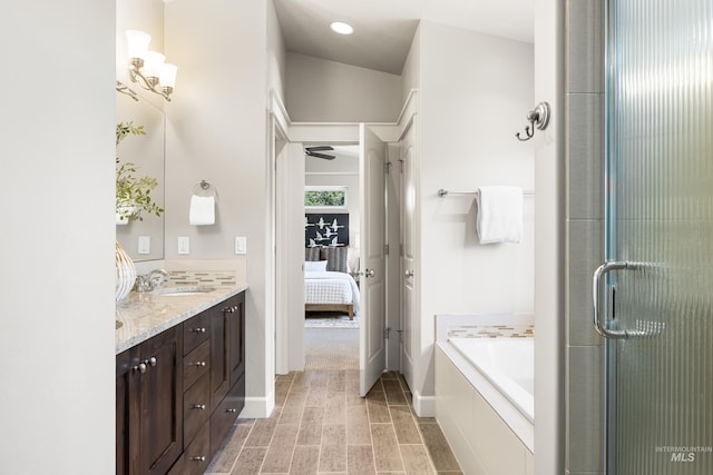 5826 E Playwright St, Boise, ID 83716 - ensuite bathroom with a bath, double vanity, a shower with door, and ceiling fan