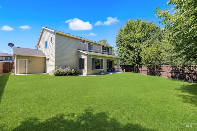 5826 E Playwright St, Boise, ID 83716 - back of property featuring a fenced backyard