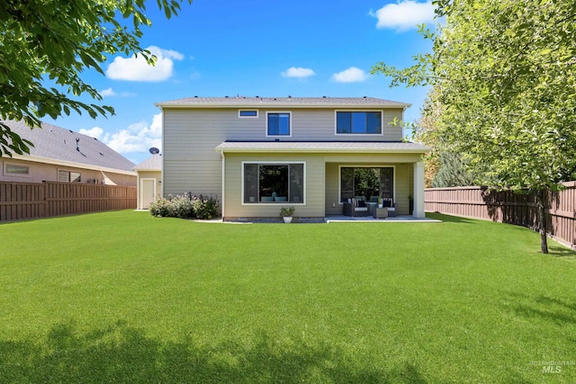 5826 E Playwright St, Boise, ID 83716 - rear view of house featuring a fenced backyard, an outdoor living space, and a patio