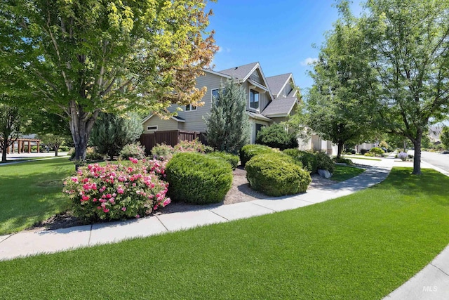 5826 E Playwright St, Boise, ID 83716 - view of property exterior featuring a yard