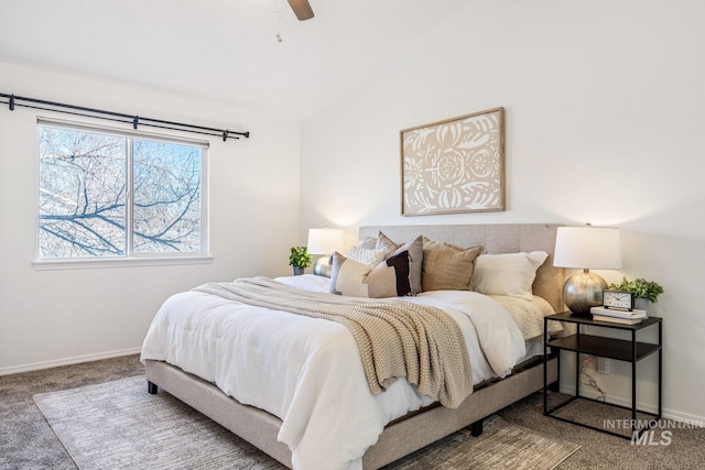 bedroom featuring lofted ceiling, carpet floors, and ceiling fan