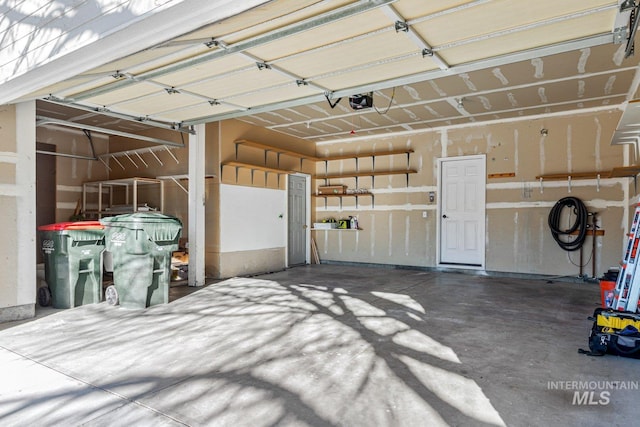 garage featuring a garage door opener