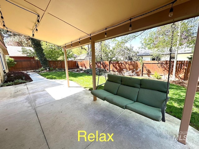 view of patio with an outdoor hangout area and a fenced backyard
