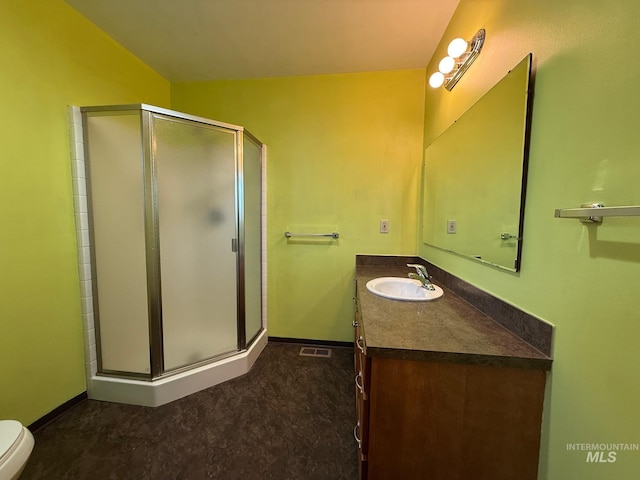 full bath featuring baseboards, visible vents, a shower stall, and vanity