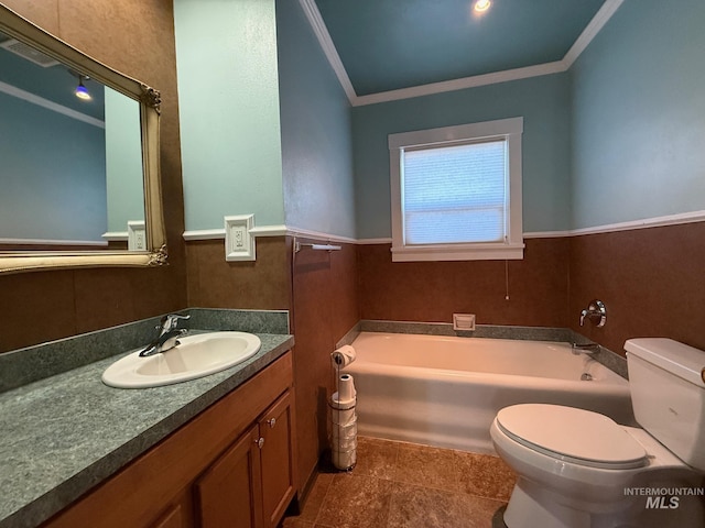 full bathroom with ornamental molding, vanity, toilet, and a bath